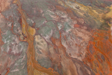 Aerial shot of oxidized iron minerals in water in old mining area, Río Tinto. Huelva Province, Spain