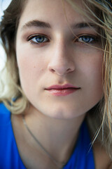 Fototapeta premium Closeup portrait of a confidence blonde girl with makeup.