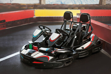 Empty two Seater go kart in pit lane