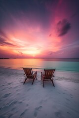 Fototapeta premium Two beach chairs on the beach of the Maldives at a beautiful sunset. Generative AI
