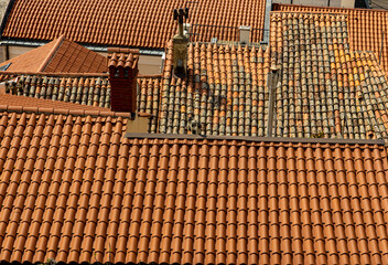 Fototapeta premium Roofs with red tiles, as part of Mediterranean traditional buildings