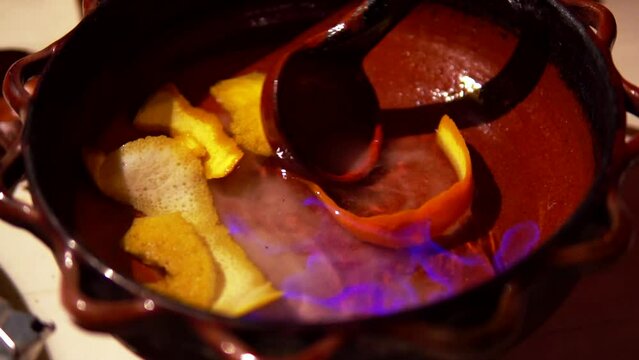 Preparation of queimada alcohol drink during San Juan holiday in Galicia, Spain