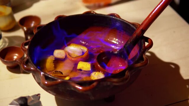 Preparation of queimada alcohol drink during San Juan holiday in Galicia, Spain