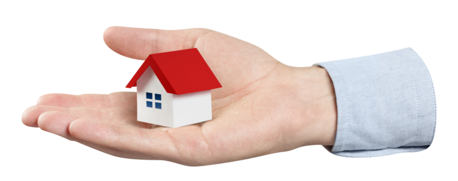 Hand holding a small red roofed house, cut out