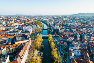Aerial view of Graz city in Austria with the beautiful river Mur in the centre