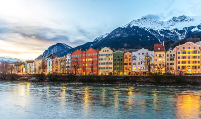 View of the evening embankment of the Austrian Innsbruck in winter - obrazy, fototapety, plakaty