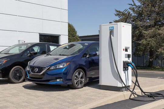 ABB EV Electric Vehicle Charger with multiple connections at a Nissan dealership. ABB offers EV charging solutions.