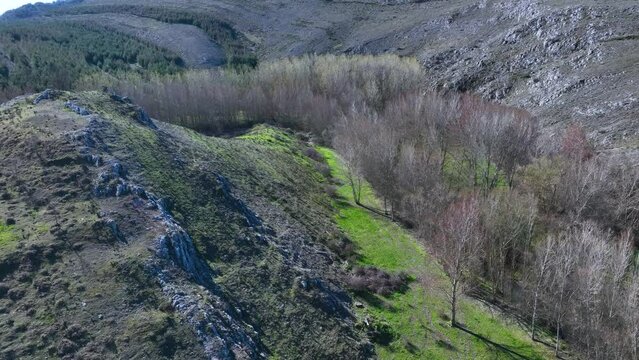 Landscape of crops and reliefs in Renedo de la Inera. Aerial view from a drone. World geological heritage UNESCO. Las Loras Geopark. Palencia. Castile and Leon. Spain, Europe
