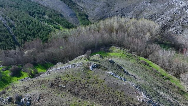Landscape of crops and reliefs in Renedo de la Inera. Aerial view from a drone. World geological heritage UNESCO. Las Loras Geopark. Palencia. Castile and Leon. Spain, Europe