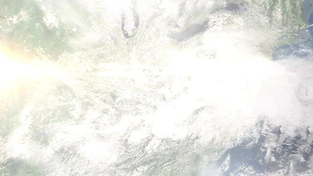 Earth zoom in from outer space to city. Zooming on Georgetown, Kentucky, USA. The animation continues by zoom out through clouds and atmosphere into space. Images from NASA