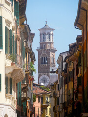 Street of Verona (Italy) with the tower "Torre dei Lamberti" in the back