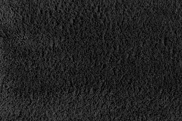 Fototapeta premium texture of dark gray terry cloth fabric. close up of a towel terry cloth