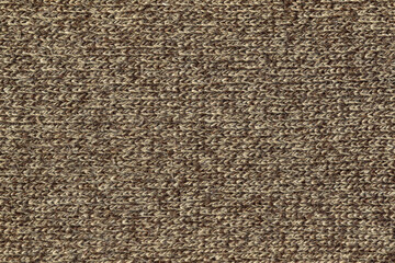 The texture of a knitted wool mix beige brown.