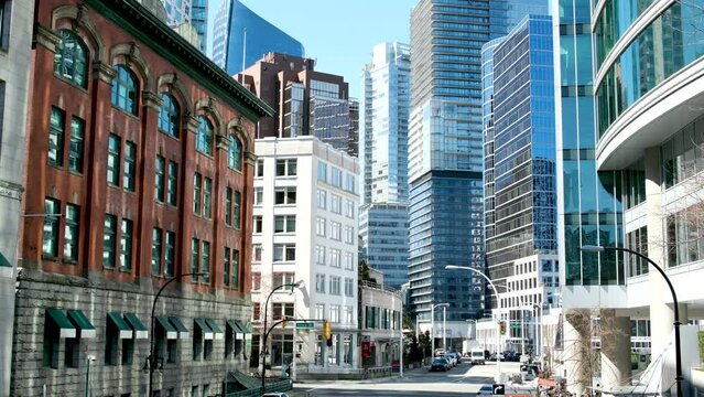downtown Vancouver skytrain terminus Waterfront railway building people on the street Real life in Canada different nationalities travel walk Canada Vancouver 2023