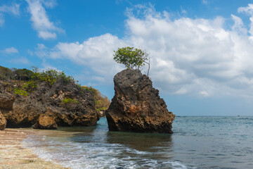 View of the sea from a tropical beach with an expressive sky. Beach in Bali, Indonesia - nature, recreation, background