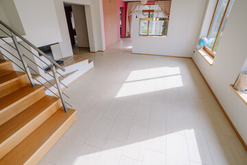 Empty room interior with fireplace and aquarium