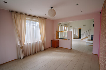 Empty room interior with fireplace and aquarium