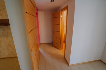 House interior with pink walls in the corridor