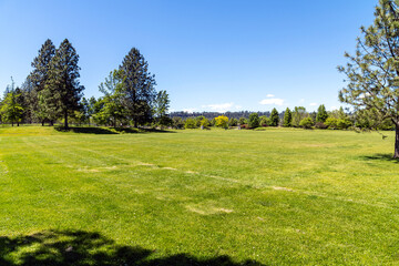 The suburban Mirabeau Point Park in Spokane Valley, Washington, USA on a summer day.	