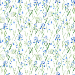 Seamless watercolor pattern with wildflowers bluebell, forget-me-not, iris, Queen Annes lace on white background. Can be used for fabric prints, gift wrapping paper, kitchen textile.