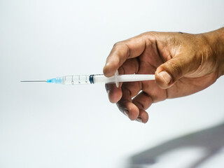 hand with syringe