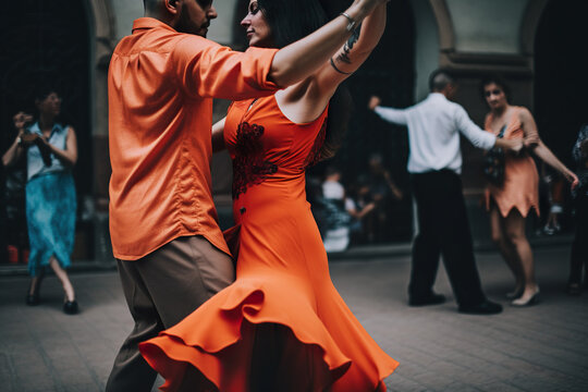 Young couple dancing tango or salsa on the street, AI generative illustration