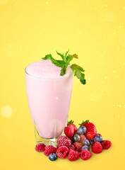 Tasty sweet milk shake with berry in glass