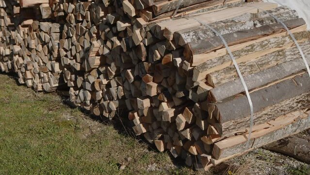 row of logstacks at outdoor woodyard