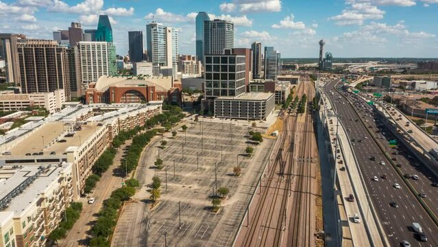 An aerial time-lapse (hyper-lapse) of traffic racing up I-35E through Downtown Dallas.