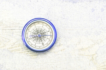 round compass on natural background