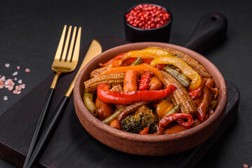 Mix of vegetables corn, carrots, peppers, broccoli, onions in teriyaki sauce