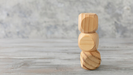 Business  design concept. There abstract geometric staking wooden blank dice isolate on white rustic surface.