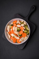 Delicious dish consisting of pieces of boiled chicken, broccoli and carrots