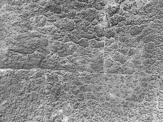 Gray stone wall natural bakground.