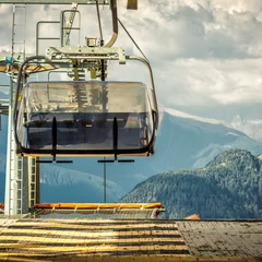 Poster gondola ski lift in mountain ski resort, green forest © nickolya