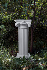 Elements of architectural decorations of buildings, columns and tops, gypsum stucco. In the park, public places.