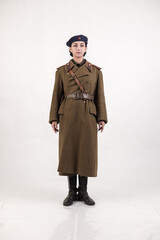 A woman in a retro military uniform, a soldier of the Soviet army during World War Two