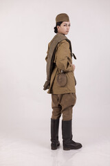 A woman in a retro military uniform, a soldier of the Soviet army during World War Two
