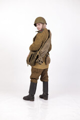 A woman in a retro military uniform, a soldier of the Soviet army during World War Two
