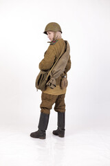 A woman in a retro military uniform, a soldier of the Soviet army during World War Two