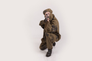 A woman in a retro military uniform, a soldier of the Soviet army during World War Two