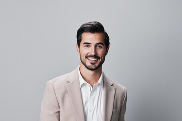 man smiling happy portrait copyspace handsome suit executive business businessman beige