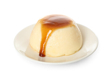 Plate with delicious pudding covered by caramel syrup isolated on white background