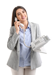 Pretty young woman talking by telephone on white background