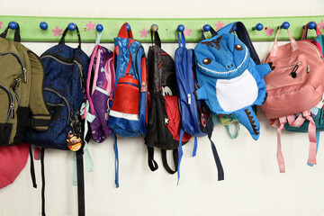 Cali-Colombia February 14, 2023, backpacks hanging on a hanger at school, kindergarten, children's...