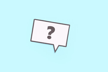 Speech bubble with question mark on blue background