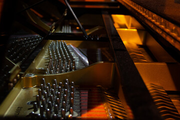Interior of a grand piano with blur.