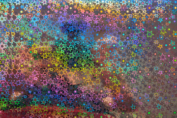 Holographic paper with a geometric pattern. Background or backdrop