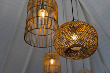Some hanging wicker lamps. different designs