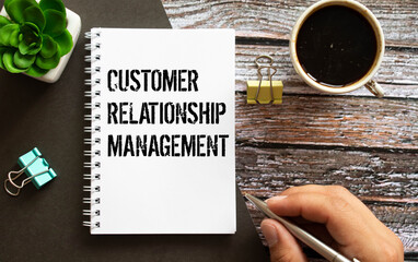 CRM.Customer Relationship Management.Text concept the on notepad. Business concept